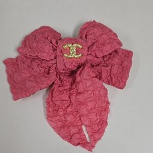 CHANEL Textured Pink Bow with Gold Logo